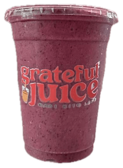 A berry smoothie in a branded Grateful Juice cup