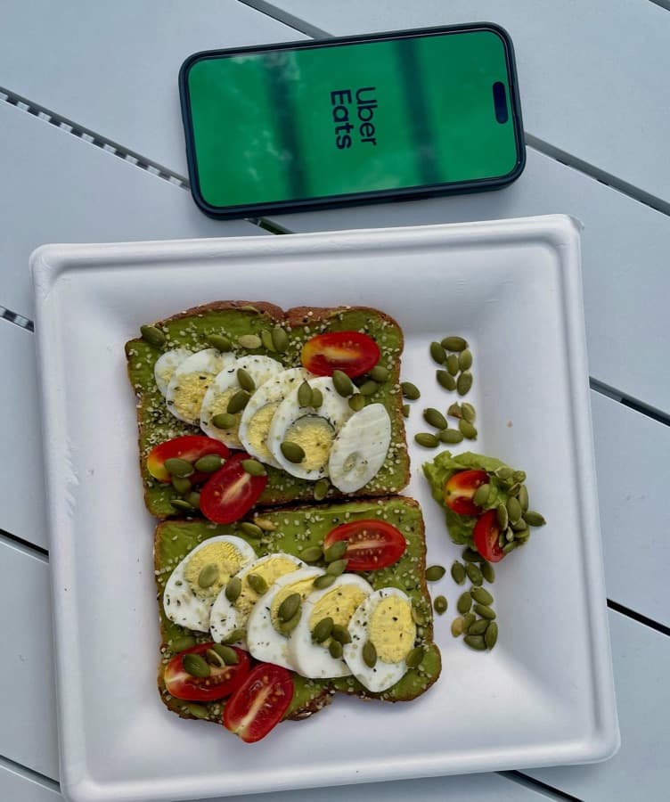 Avocado toast with boiled egg and cherry tomatoes